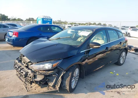 2016 Ford Focus Titanium z USA, uszkodzony, nr VIN 1FADP3N23GL339780